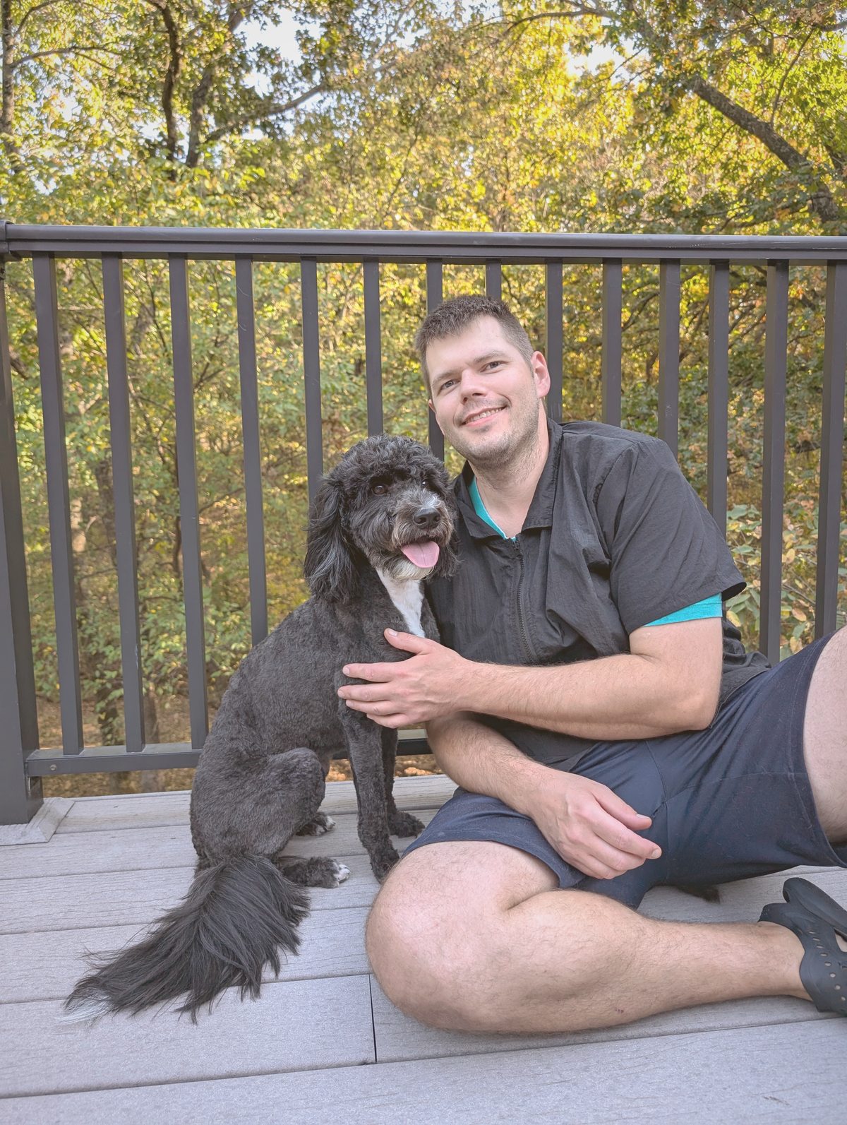 Joe with a black doodle client